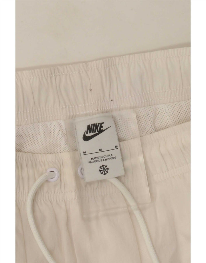 Γυναικεία αθλητική φόρμα γραφικών Nike παντελόνι Joggers UK 12 Medium White