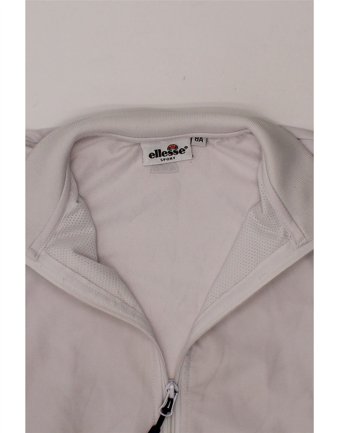 ELLESSE Girls Tracksuit Top Jacket 7-8 Years Off White Polyester Vintage Ellesse and Second-Hand Ellesse from Messina Hembry 