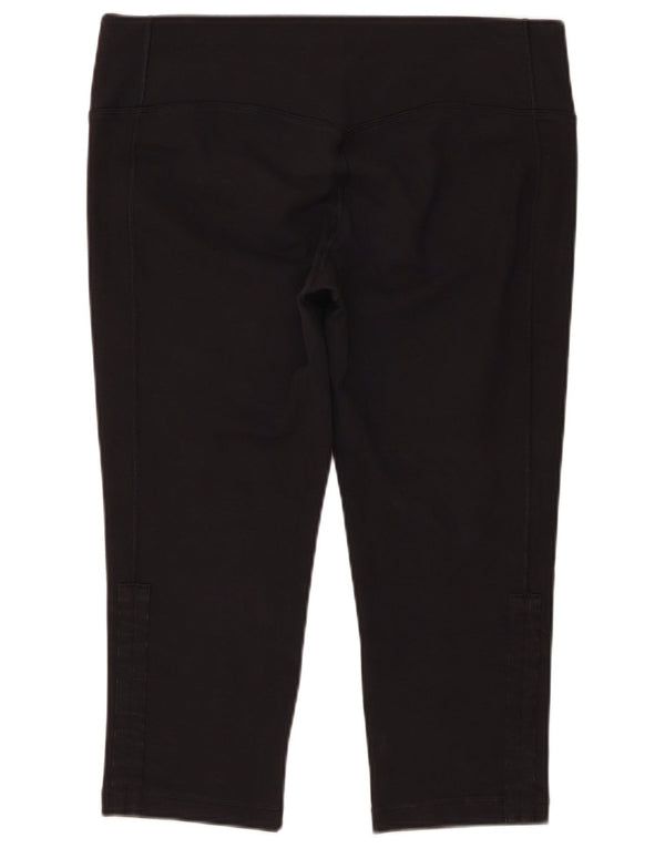 Γυναικεία κολάν Nike Dri Fit Capri UK 18 XL Μαύρο