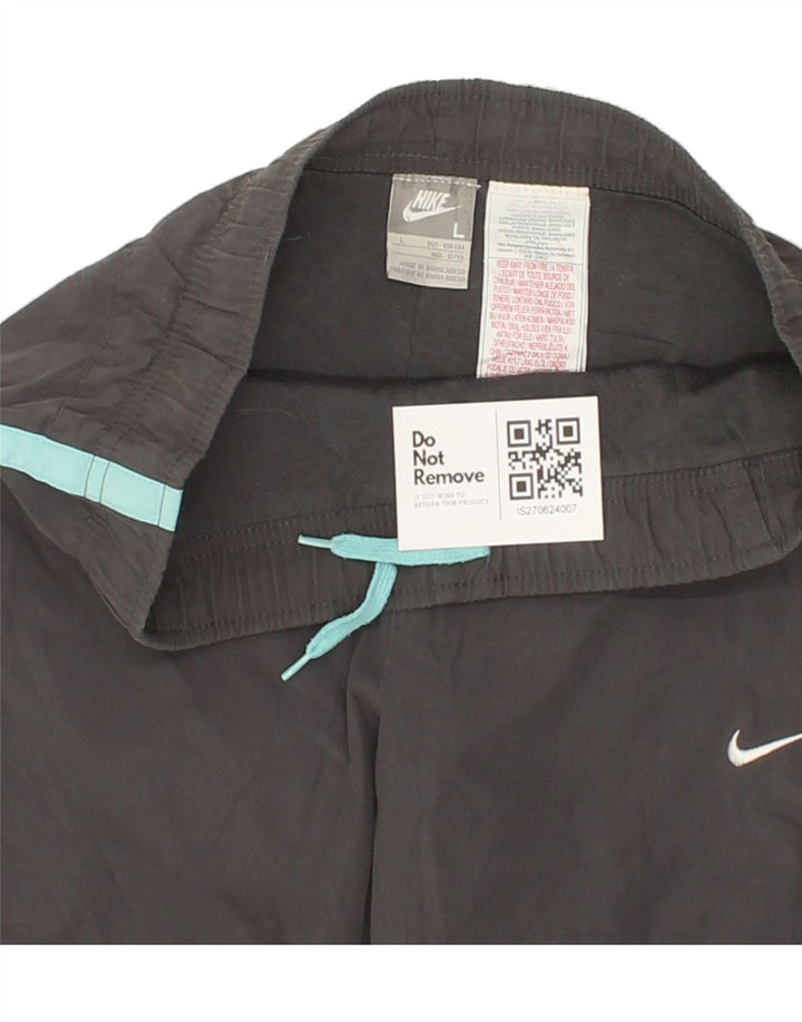 NIKE Boys Tracksuit Trousers 12-13 Years Large Grey Polyester Vintage Nike and Second-Hand Nike from Messina Hembry 