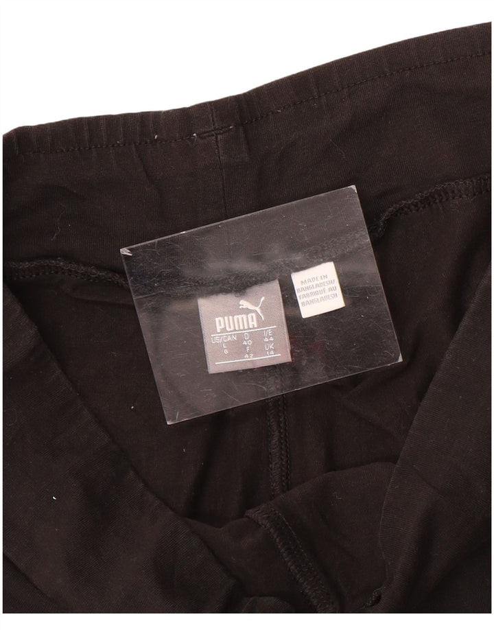 Γυναικεία γραφικά κολάν Puma UK 14 Medium Black