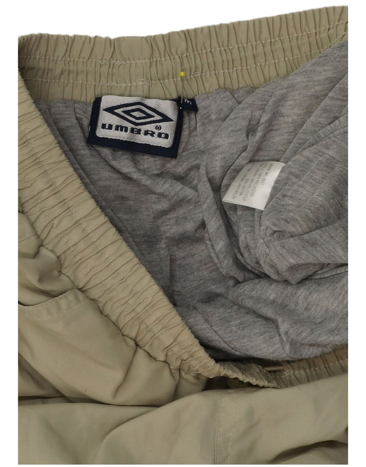 Ανδρικό βερμούδα αθλητικό σορτς Umbro από μεσαίο χακί πολυεστέρα