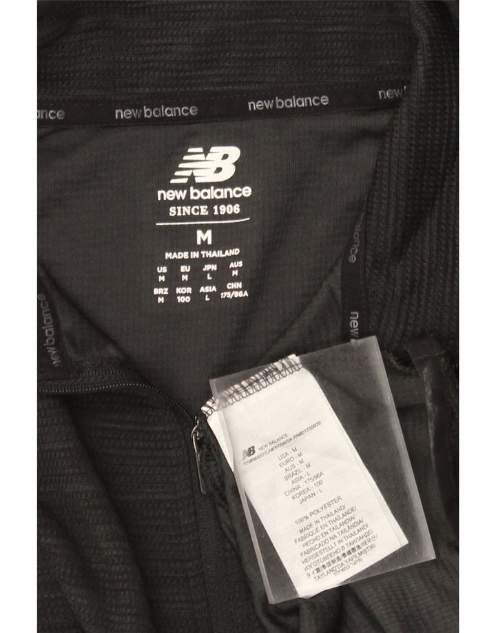 Ανδρική φόρμα πουλόβερ με φερμουάρ New Balance Top Medium Μαύρο Πολυεστέρας