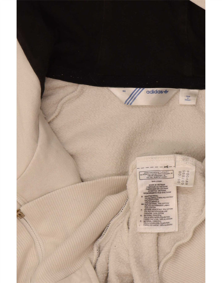 Γυναικείο πουλόβερ με κουκούλα με φερμουάρ Adidas IT 44 μεσαίο λευκό χρώμα