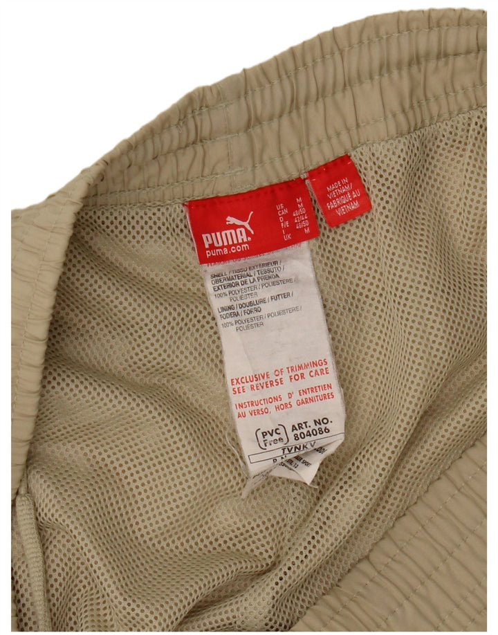 Ανδρική φόρμα αθλητικής φόρμας PUMA Graphic Capri Medium Beige Polyester