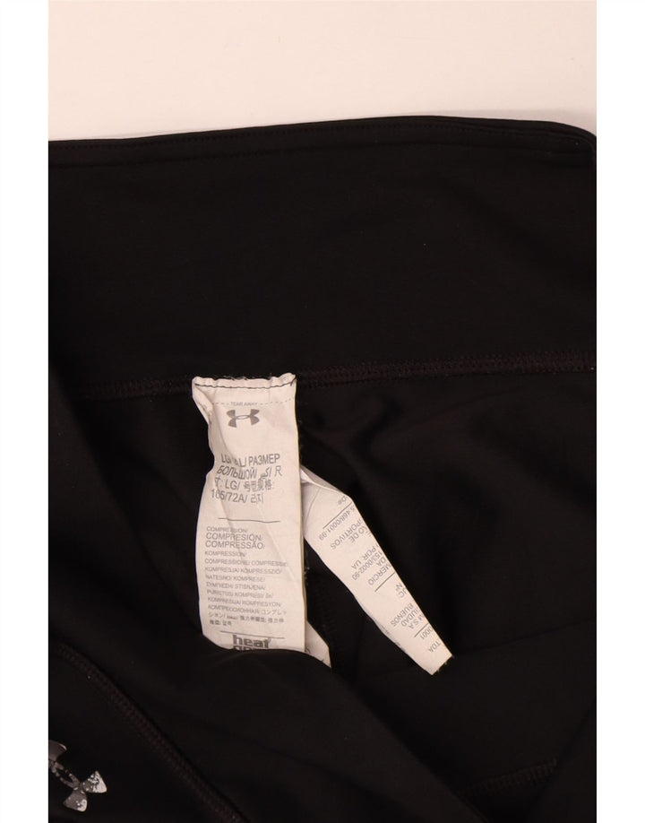 Under Armour Γυναικεία γραφικά Κάπρι Κολάν UK 14 Large Black Polyester