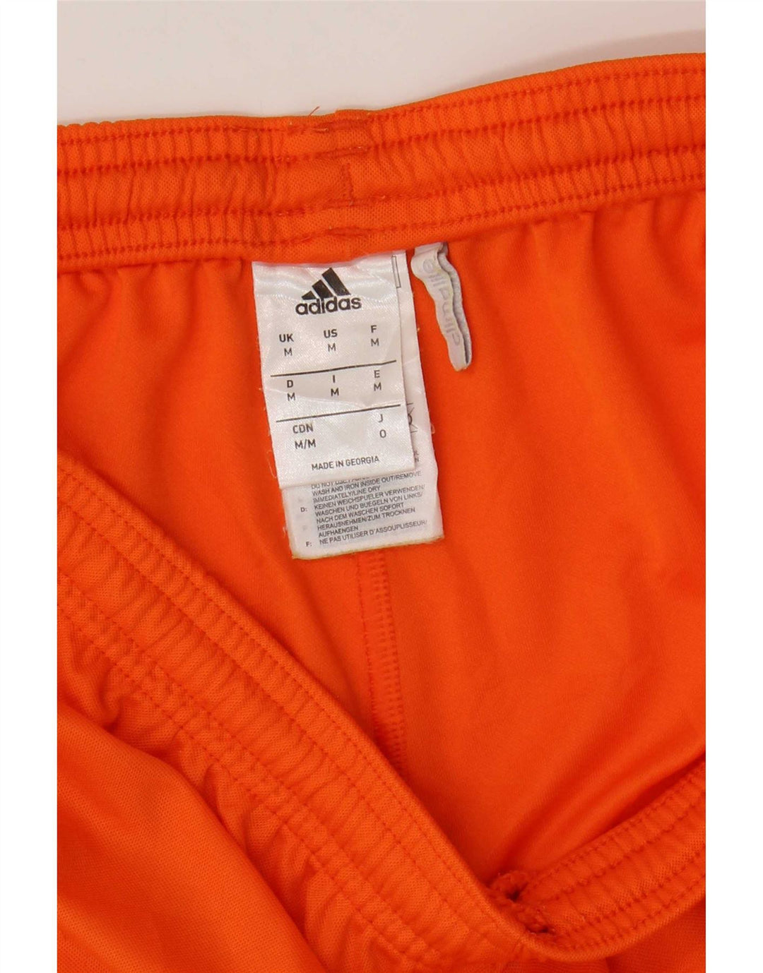 Ανδρικό σορτς Adidas Climalite από μεσαίο πορτοκαλί πολυεστέρα